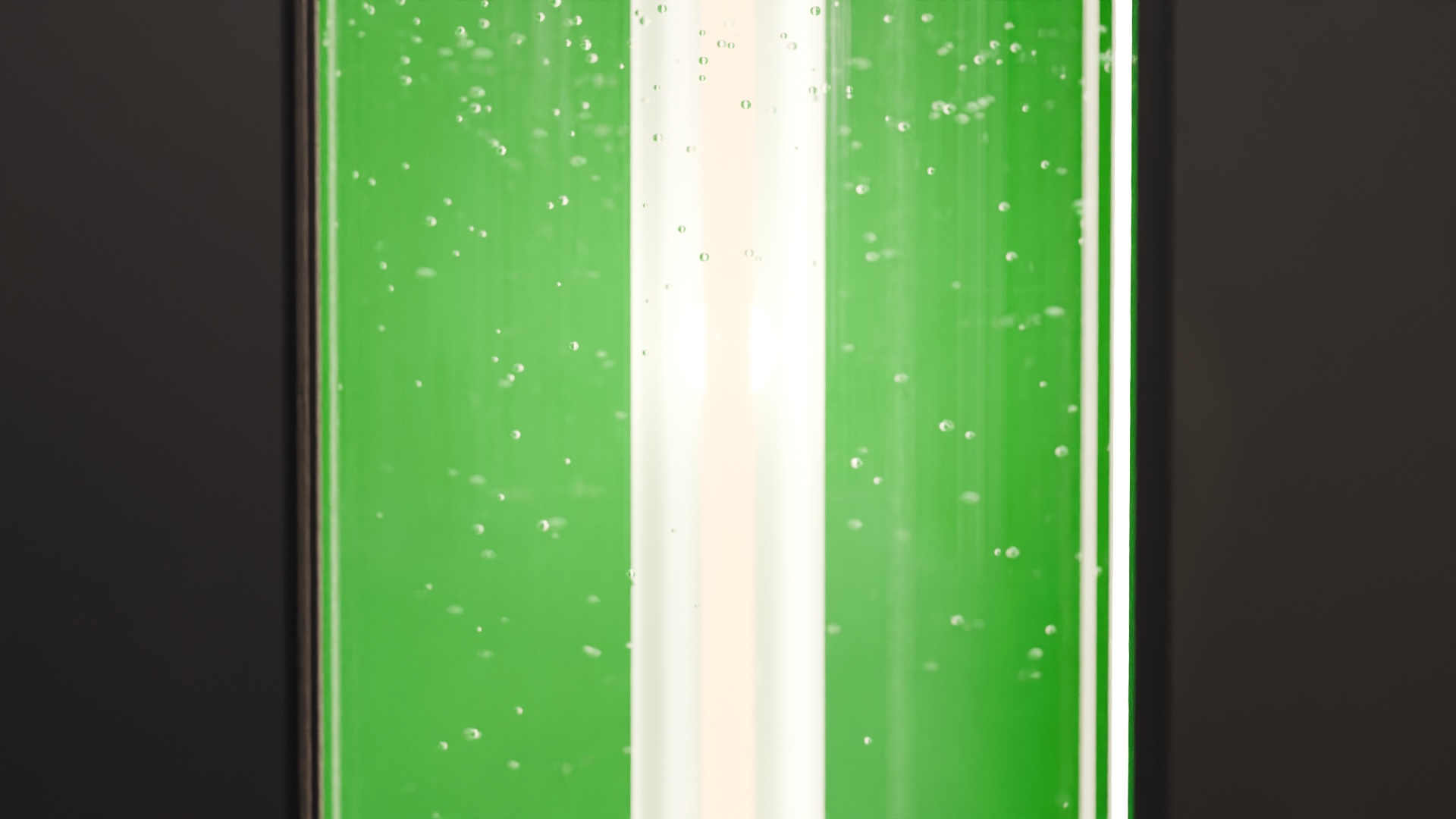 Oxygen bubbles rising through the microalgae culture